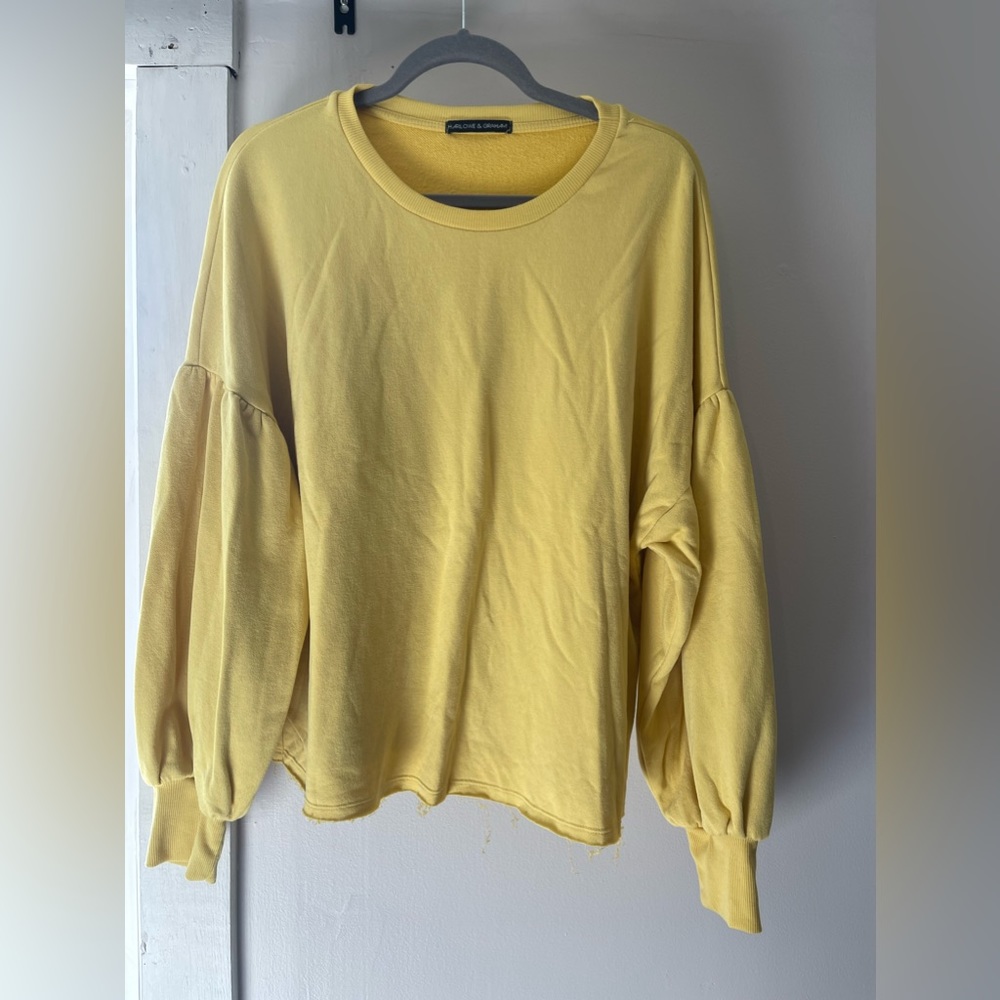 Yellow pullover sweater